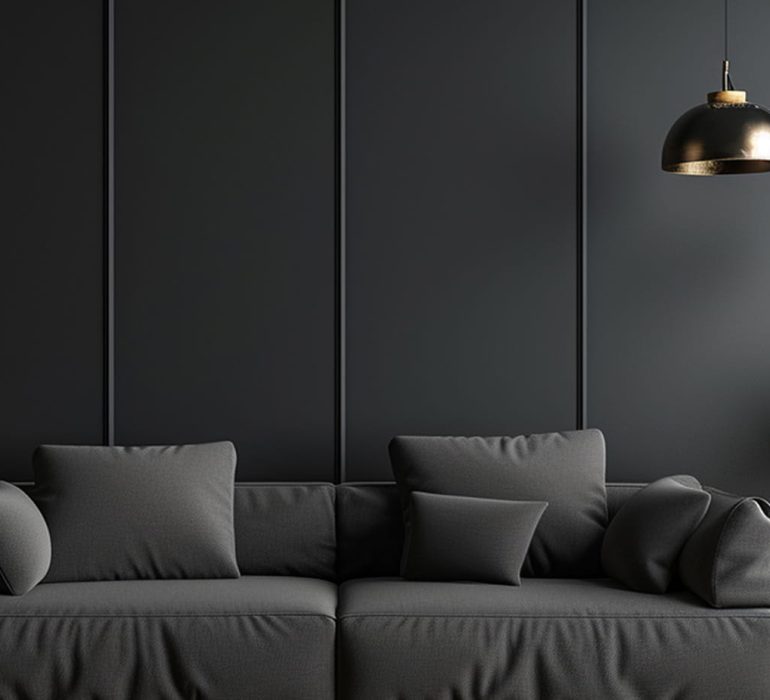 Modern dark living room with grey sofa and indoor plants
